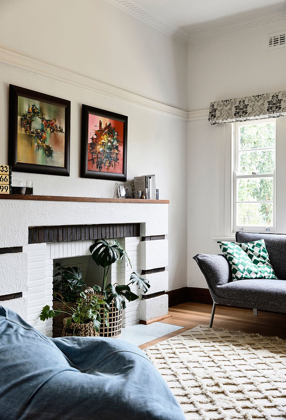 Some of the original elements of the Art Deco home have been preserved and enhanced like the fireplace in the living room