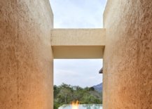 Stone-walls-that-create-entry-to-the-pool-deck-create-the-illusion-of-fire-and-water-at-the-house-55339-217x155