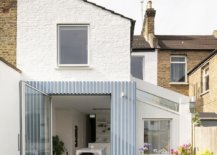 Striped-rear-extension-in-white-and-blue-with-brick-walls-next-to-them-blends-modern-and-concrete-styles-11210-217x155