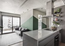 Use-of-green-along-with-burnt-cement-creates-a-modern-industrial-style-in-the-chic-Sao-Paulo-Apartment-87451-217x155