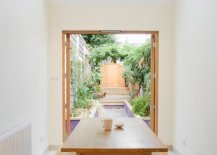 View-of-the-outdoor-space-and-garden-from-the-dining-room-of-the-slim-home-75671-217x155