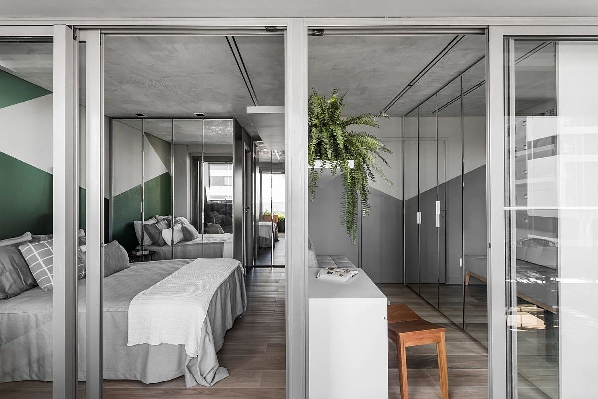 Walk-in-wardrobe-and-bedroom-of-the-small-contemporary-apartment-in-Sao-Paulo-98886