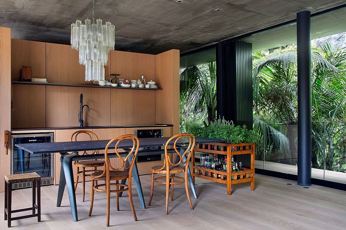 Wooden kitchen and dining area of the light-filled Rio home
