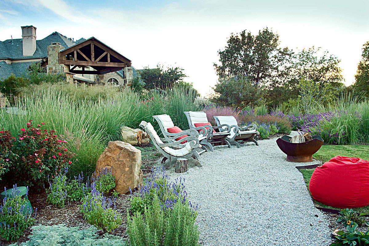 Bean bag and outdoor cushions bring pops of red to the rustic landscape