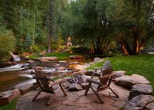 Expansive-and-relaxing-rustic-backyard-with-stone-deck-amazing-natural-water-feature-and-a-cozy-fireplace-64460-217x155