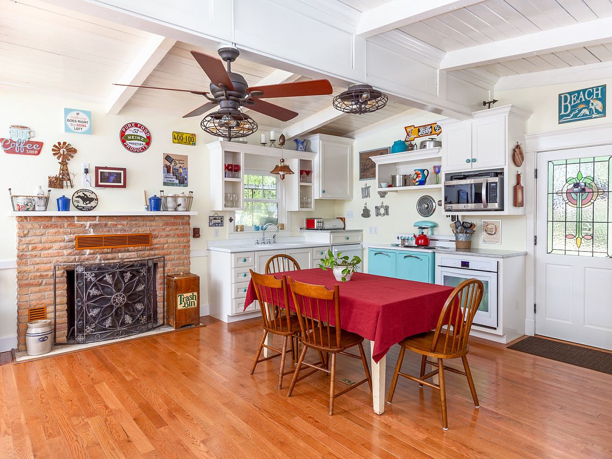 Fabulous farmhouse style kitchen of Austin home with splashes of red and turquoise along with an exposed brick section