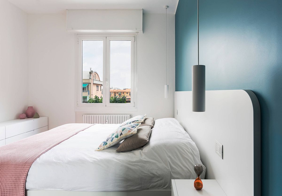 Gorgeous blue accent wall for the small bedroom in white