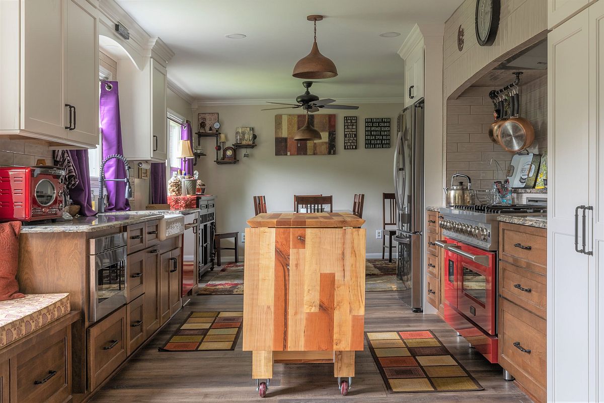 Gorgeous custom wooden island on wheels is just right for this lovely modern eclectic kitchen