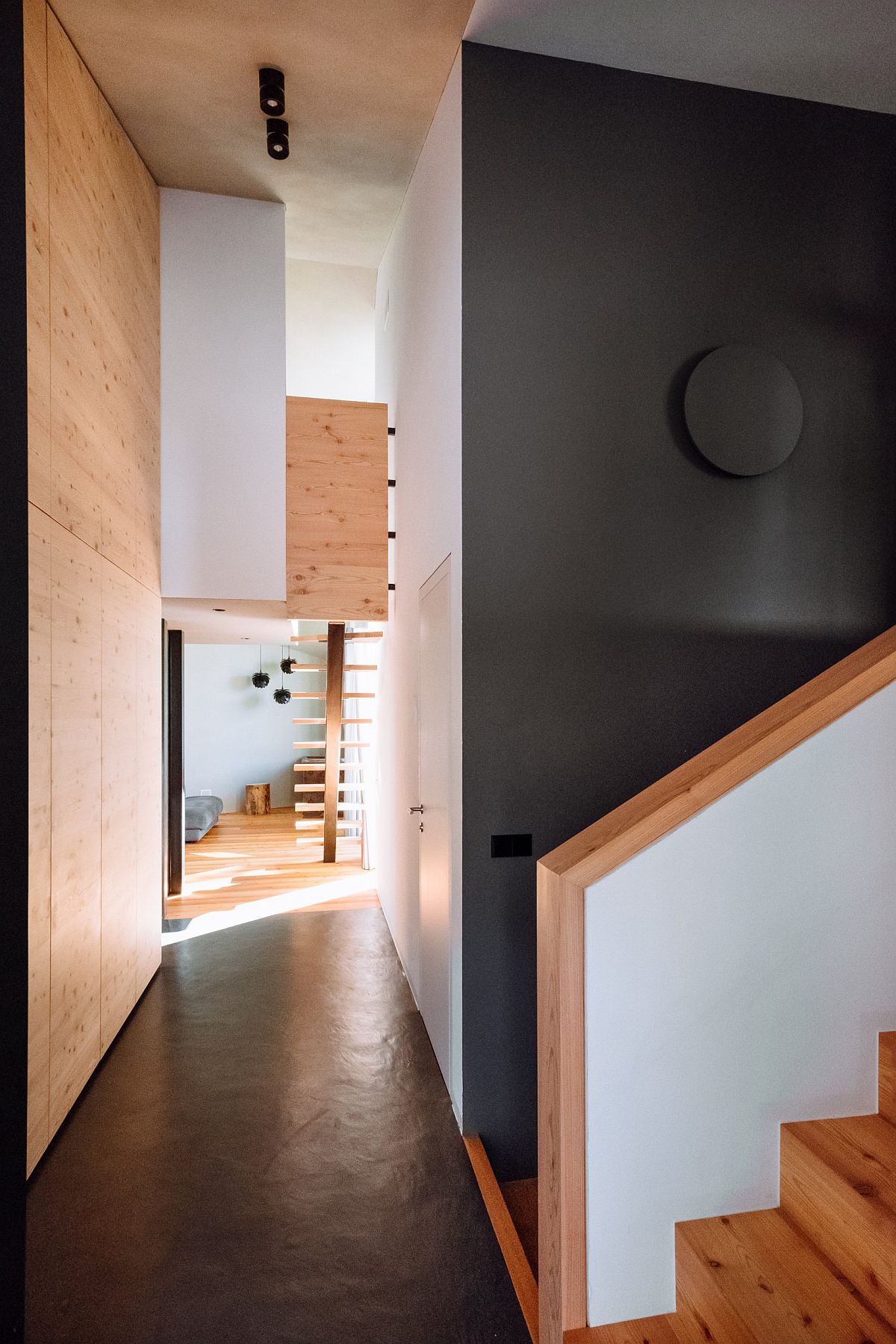 Gray, wood and white interior of the fabulous contemporary home in Italy