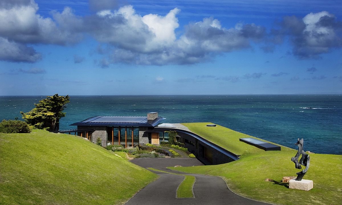 Off-Grid Green Home Powered by Clean Energy Blends into Coastal Landscape