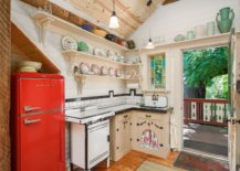 It-is-the-vintage-refigerator-in-red-that-brings-color-to-this-small-farmhouse-style-kitchen-in-wood-and-white-63136-217x155