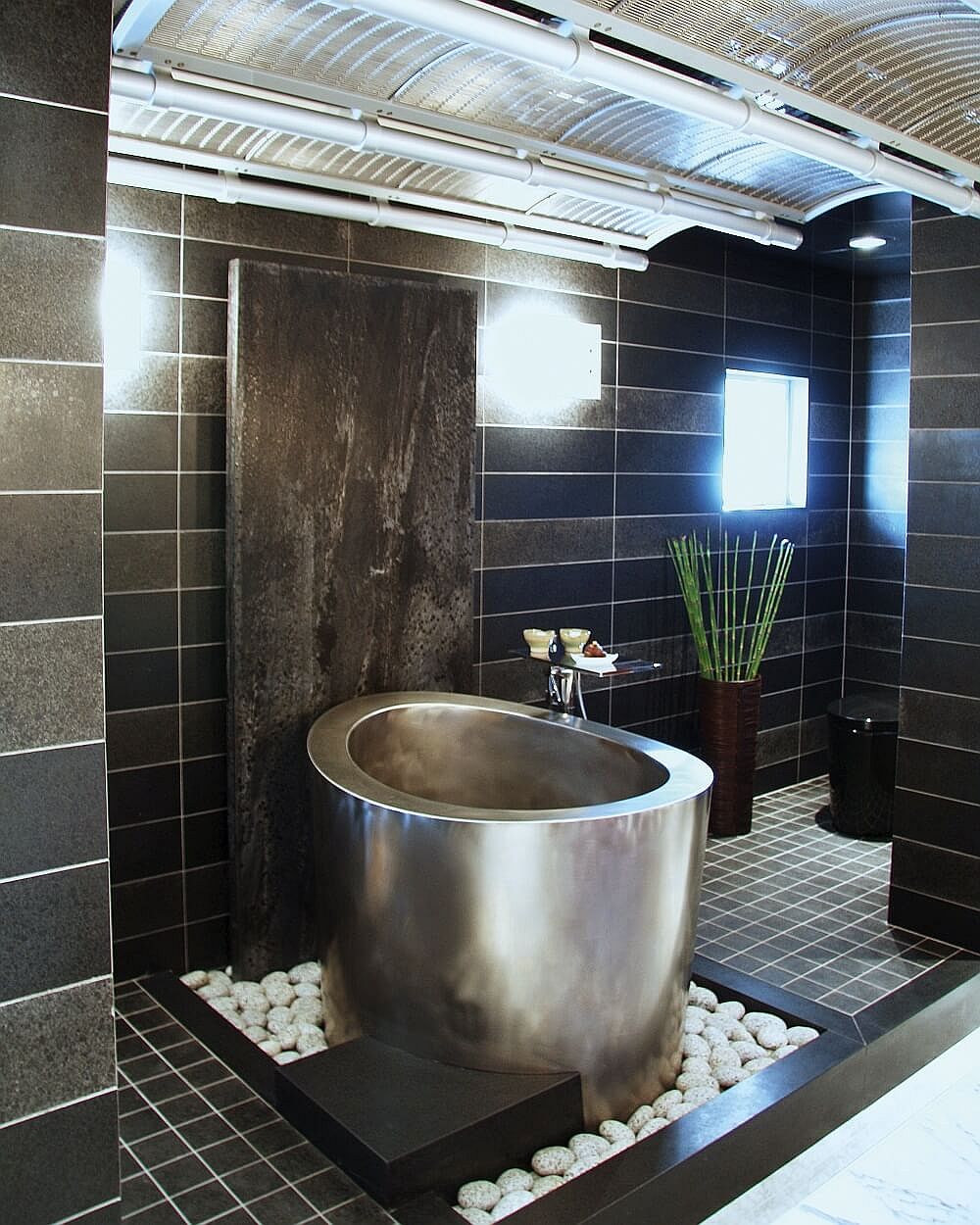 Japanese soaking tub in stainless steel is just perfect for the modern, spa-styled bathroom