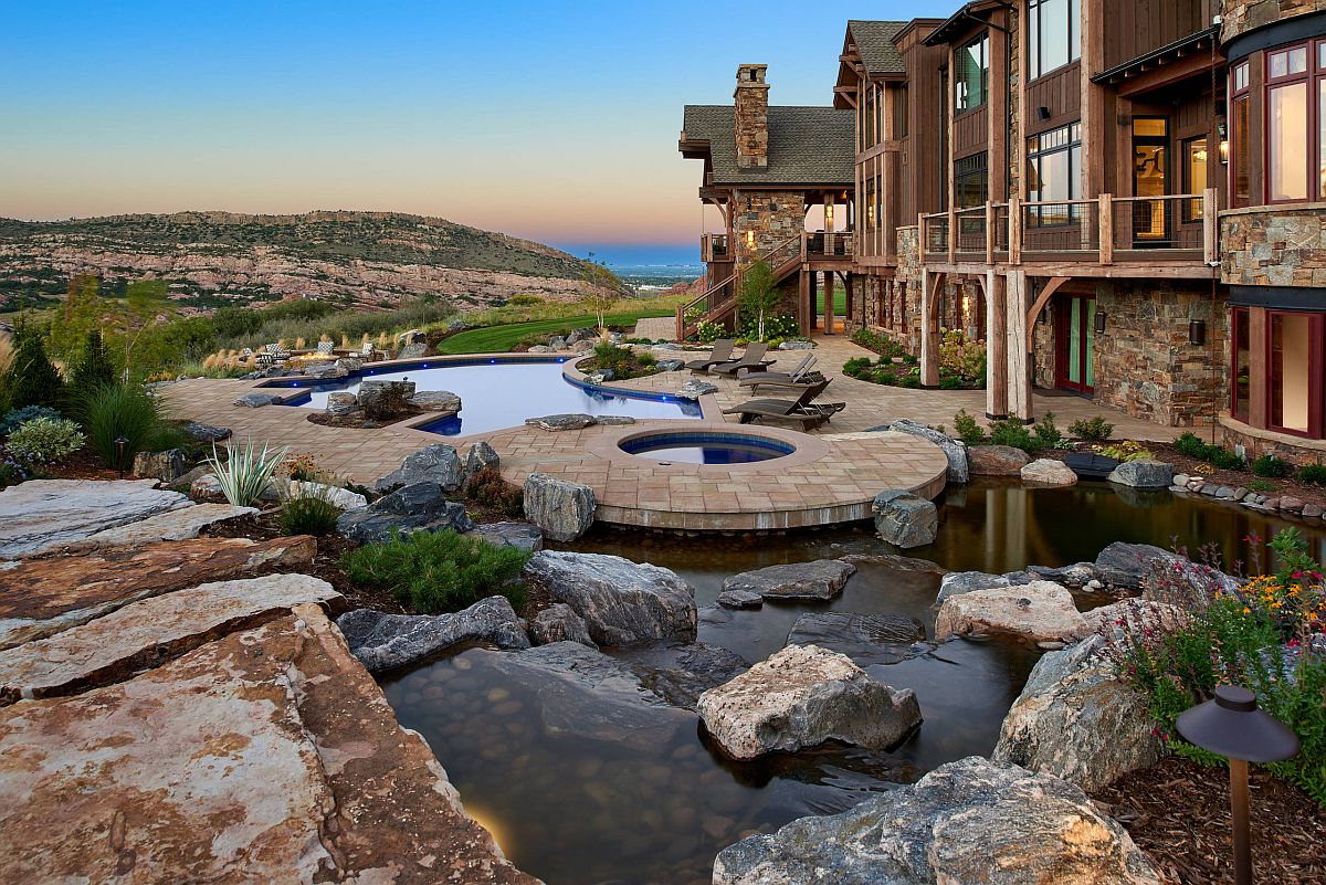 Natural pond, pools and a mesmerizing view make the biggest impression at this rustic backyard