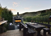 Outdoor-sone-fireplace-hangout-and-dining-area-allows-you-to-spend-time-out-with-friends-and-family-78711-217x155