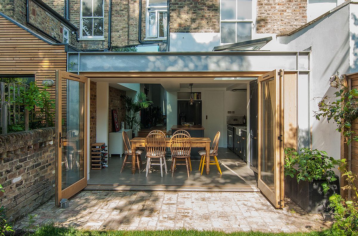 Rear extension of home in Stoke with a steel frame along with glass and wood bi-folding doors