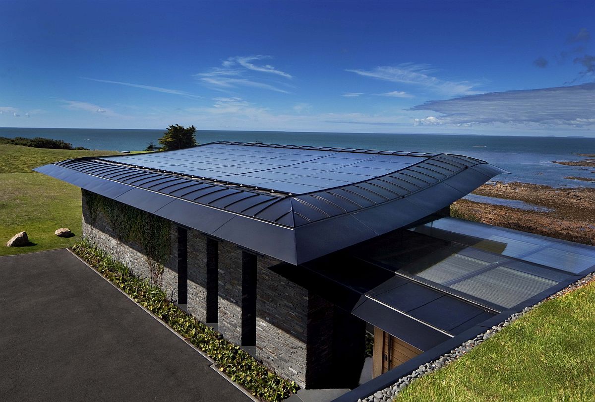 Slate and natural stone shape this stunning contemporary coastal home that is also eco-freindly