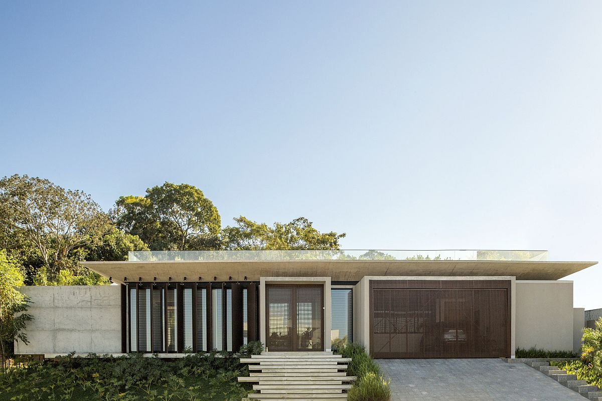 L-Shaped Contemporary Home in Brazil with a Green Roof and Lovely Courtyard