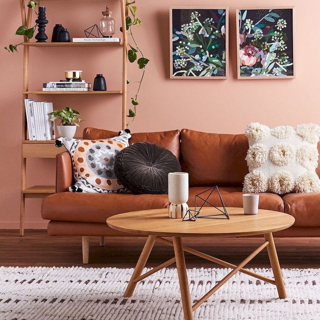 living room with brown accents and peach walls [From Swoonworthy]