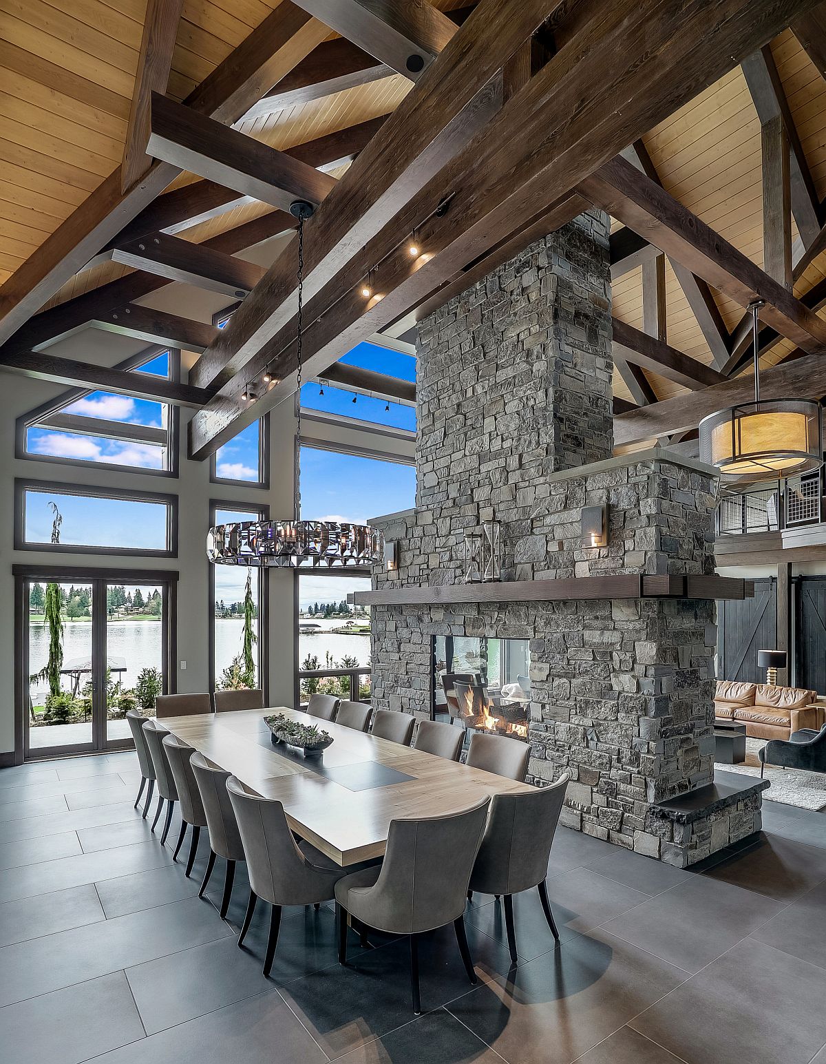 Breathtaking two-sided fireplace in stone for the rustic interior