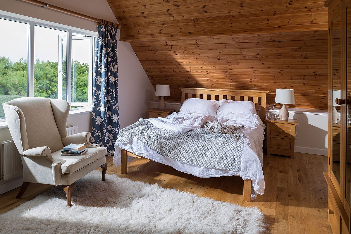 Combine woodsy charm of cabin style with coastal elegance in the bedroom