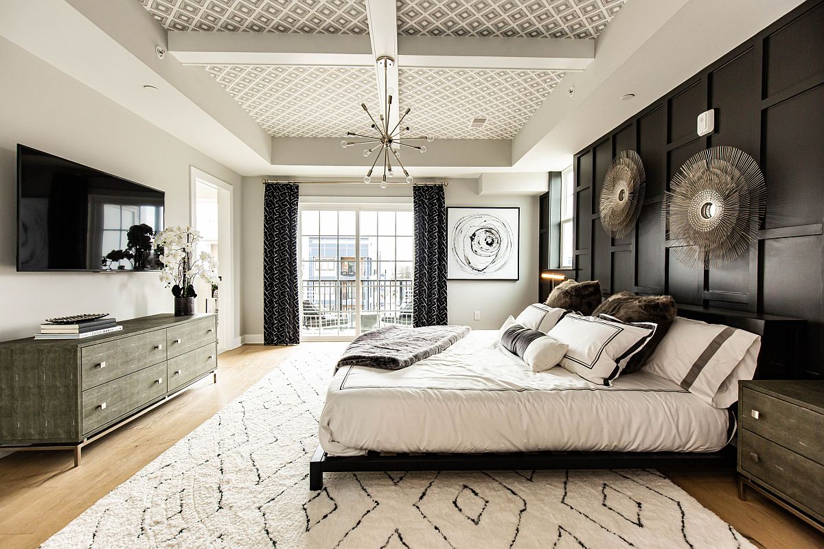 Exquisite master bedroom in neutrals with a television