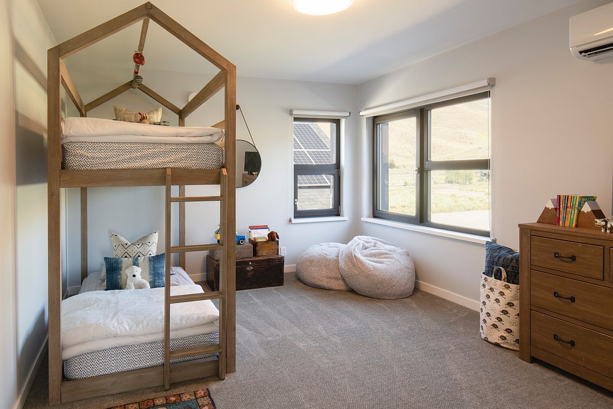 Lovely-frame-of-the-bed-in-wood-takes-centerstage-inside-this-modern-farmhouse-bedroom-29777