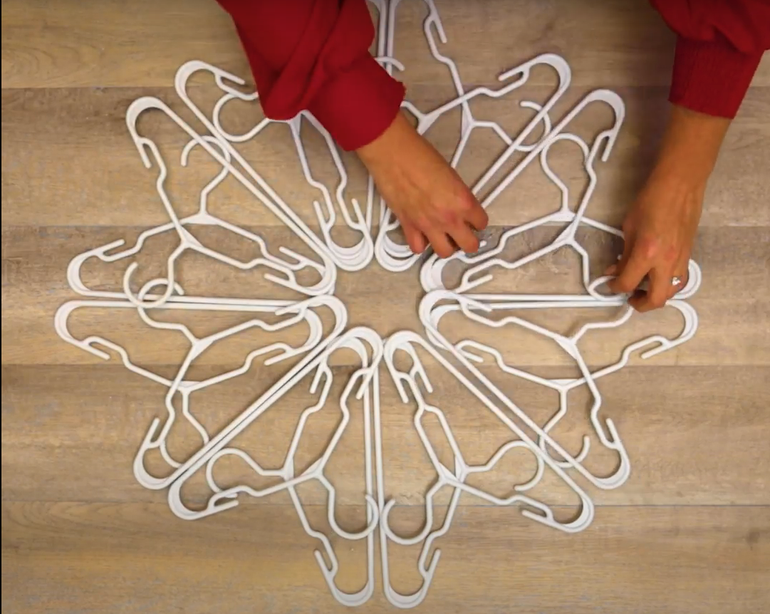 Embrace The Holidays With A DIY Coat Hanger Snowflake | Decoist