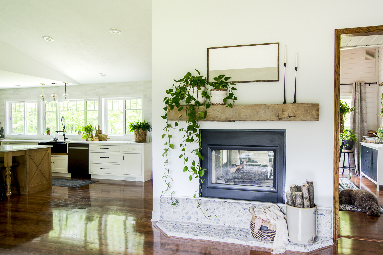 floating wooden beam mantel against white wall 