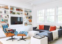 TV-at-the-center-of-the-open-white-bookshelf-becomes-an-instant-focal-point-with-ease-88118-217x155
