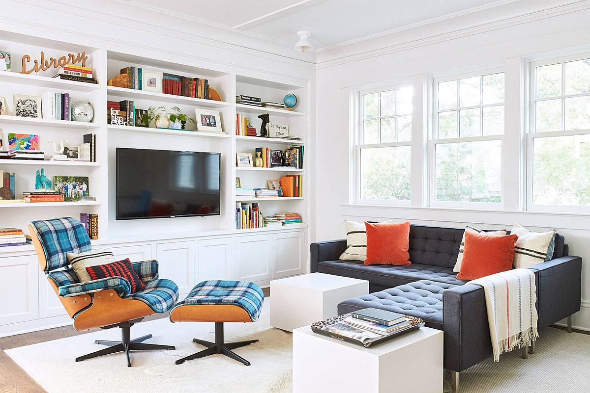 TV at the center of the open white bookshelf becomes an instant focal point with ease