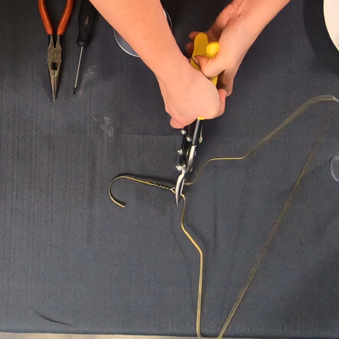 using wire cutter for coat hanger hook detachment