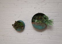 finished patina planters hanging on wall