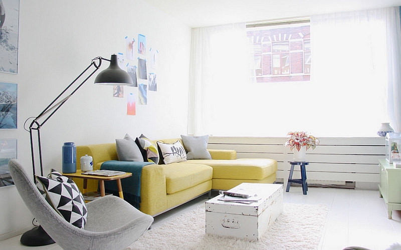 Add that brilliant yellow sofa to the living room in neutral hues to create an instant focal point