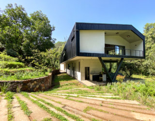 Eco-Friendly Ocoxal House: Modern Forest House Powered by Clean Energy