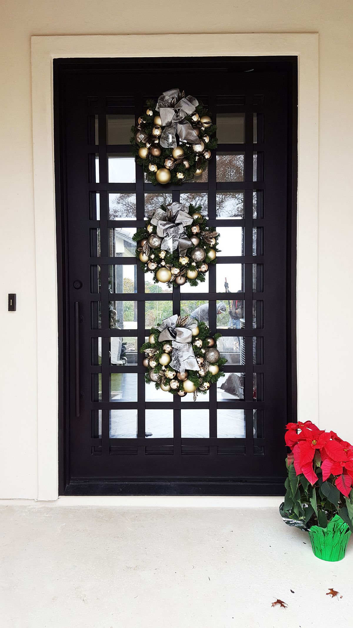 Combine evergreen wreaths with Christmas ornaments for a beautiful Holiday Season wreath