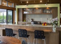 Contemporary-kitchen-with-a-wooden-island-and-breakfast-bar-along-with-a-hint-of-light-green-thrown-into-the-mix-14349-217x155