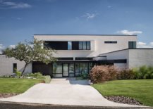 Dark-and-dashing-framed-entry-of-the-home-in-white-and-glass-is-a-showstopper-67063-217x155