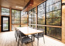 Dark-framed-windows-and-doors-usher-nature-into-the-expansive-dining-space-36063-217x155
