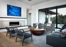 Dashing-slim-fireplace-is-at-the-heart-of-this-living-area-connected-with-the-pool-and-courtyard-59136-217x155