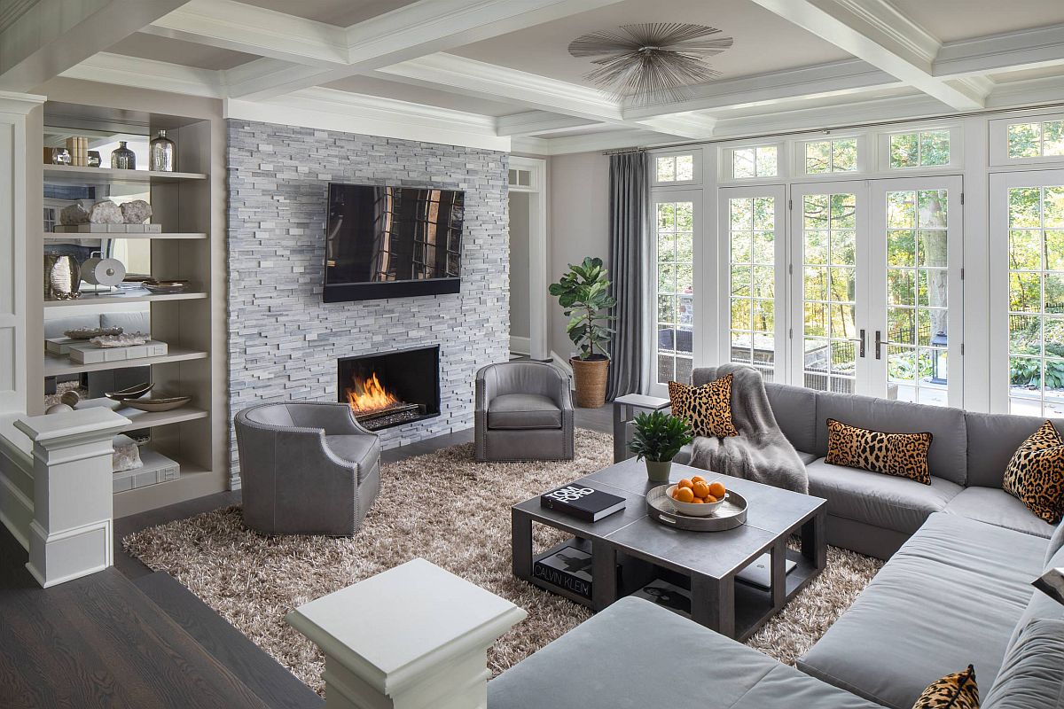 Decor and drapes bring different shades of gray to this luxurious living room