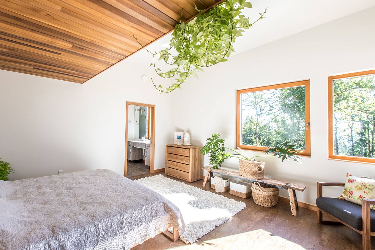 Finding-innovative-ways-to-add-greenery-to-the-small-modern-bedroom-with-lovely-views-of-canopy-outside-46135