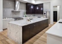 Modern-kitchen-with-stone-island-Edison-bulb-lighting-and-a-striking-gray-backsplash-11612-217x155