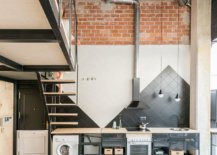 Polished-black-and-white-single-wall-kitchen-idea-inside-the-ground-level-Madrid-apartment-83589-217x155