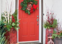 Pops-of-red-added-to-potted-plants-and-a-simple-green-wreath-make-a-difference-to-the-holiday-entry-25851-217x155