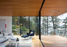 Sliding-glass-doors-connect-the-interior-with-the-natural-wooden-deck-18473-217x155