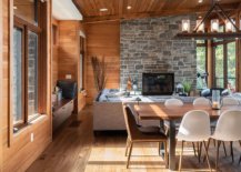 Stone-accent-wall-for-the-cabin-style-living-room-in-wood-and-glass-28781-217x155
