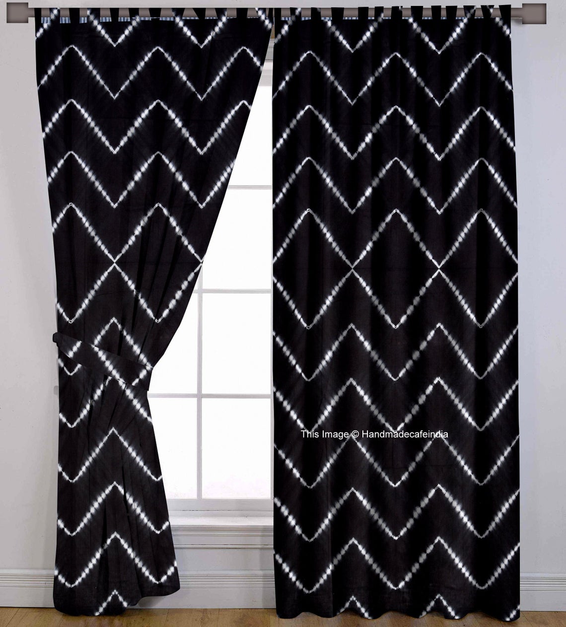 Black curtain with white zigzag pattern