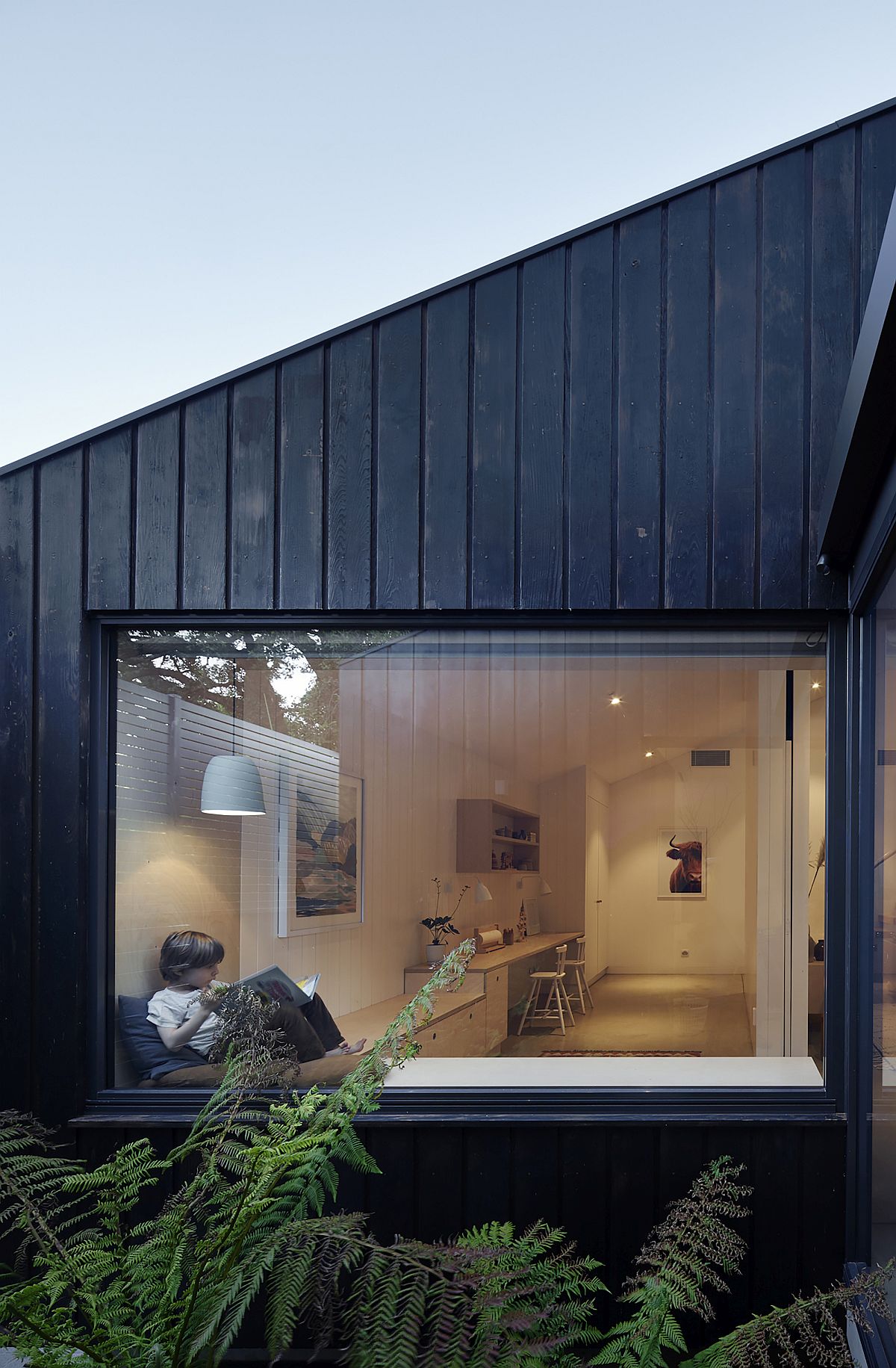 Box-styled windows with seat next to it that offer wonderful and relaxing views