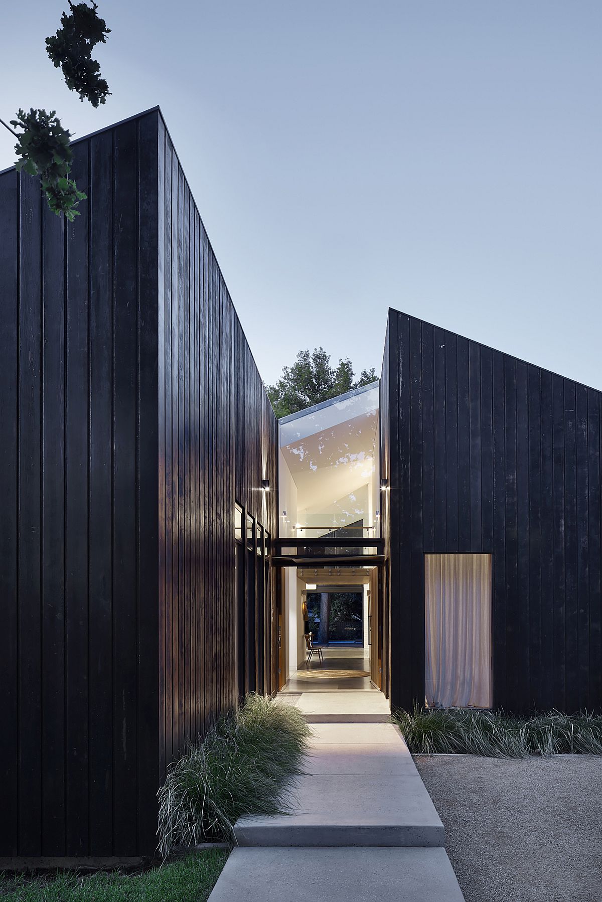 Central corridor of the house that separates the living areas and adult space from the kids' bedrooms