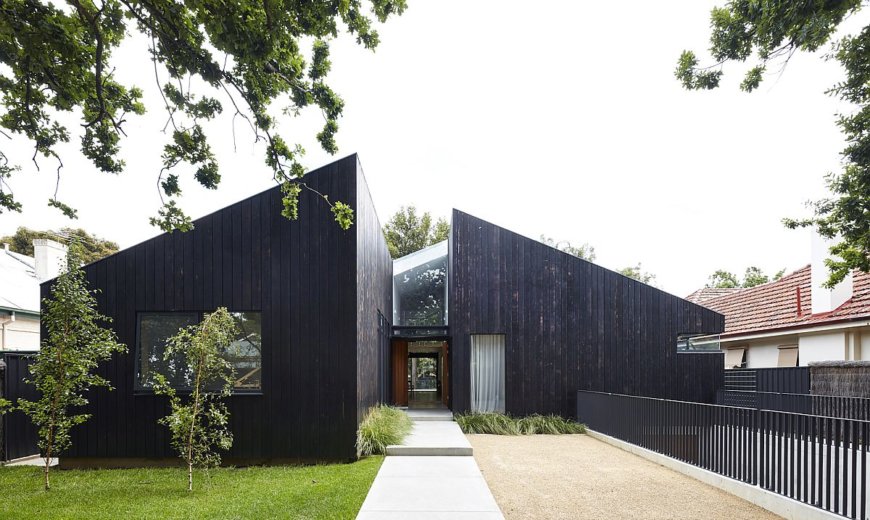 Cedar House: Dark, Dashing Exterior Conceals Cozy, Minimal Living Spaces